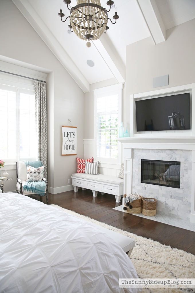 Master Bedroom Reveal! (Sunny Lifestyles) vaulted shiplap ceiling, plantation shutters, custom window bench seats, linen cabinet, french doors, wood floors, marble fireplace, sitting area, desk work space, spindle chairs.