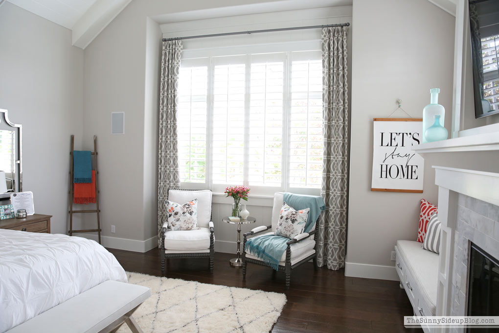 Master Bedroom Reveal! (Sunny Lifestyles) vaulted shiplap ceiling, plantation shutters, custom window bench seats, linen cabinet, french doors, wood floors, marble fireplace, sitting area, desk work space, spindle chairs.